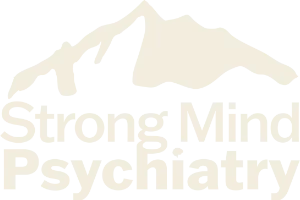 Logo for Strong Mind Psychiatry featuring a white/tan mountain side.