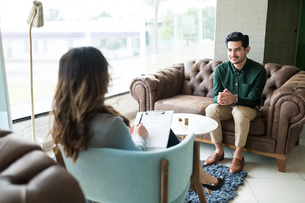 An adult with ADHD seeks professional help from a psychiatrist